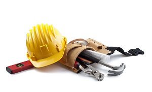 yellow hard hat and tool belt